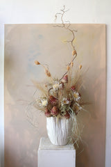 luxury dried flower arrangement with cream vase